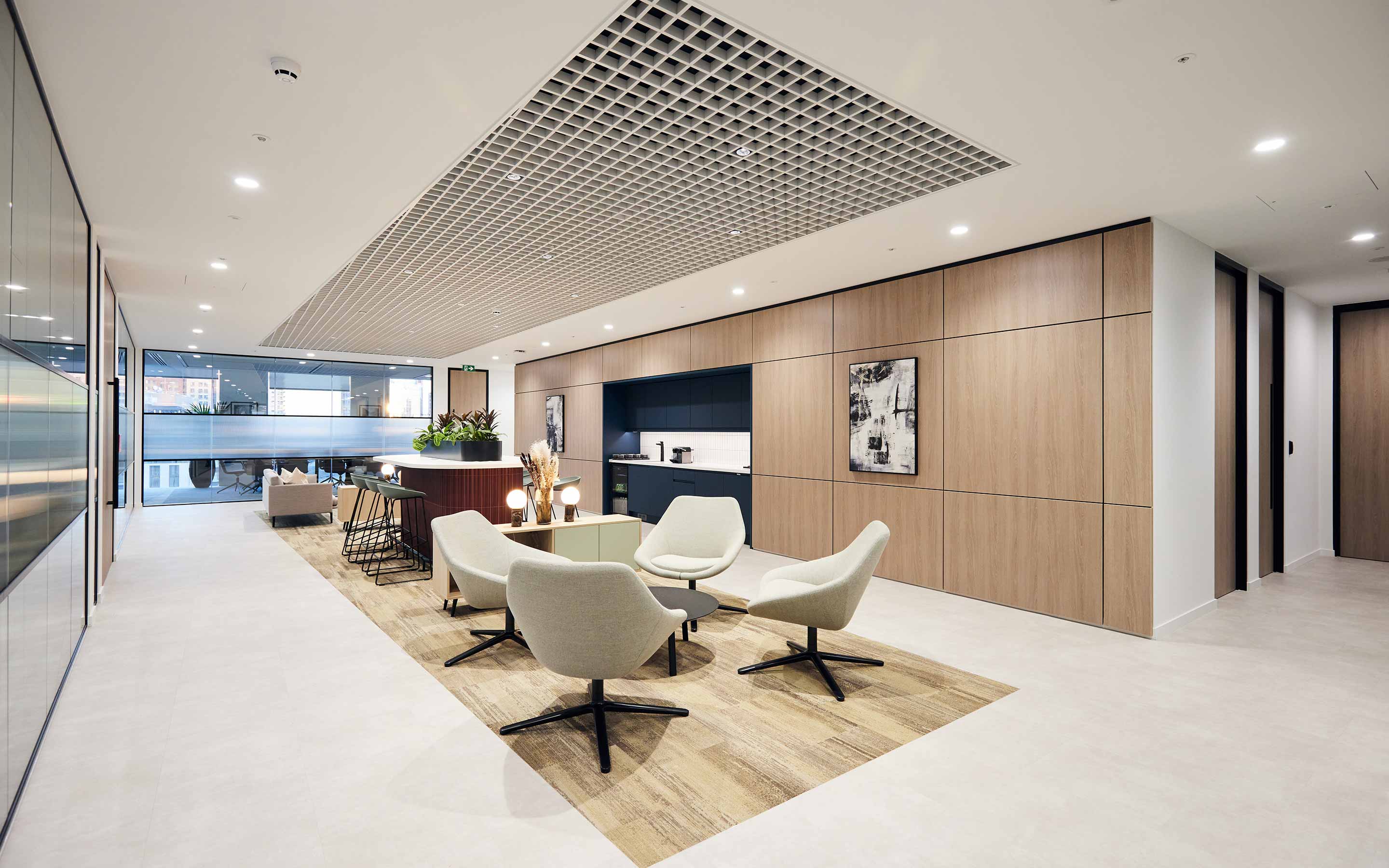 A luxurious office interior design showcasing a client waiting area for a financial services firm