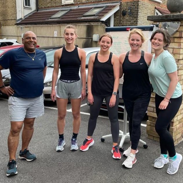 Peldon Rose employees doing group exercise outside