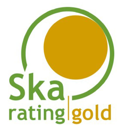 SKA gold logo, representing sustainable fit out