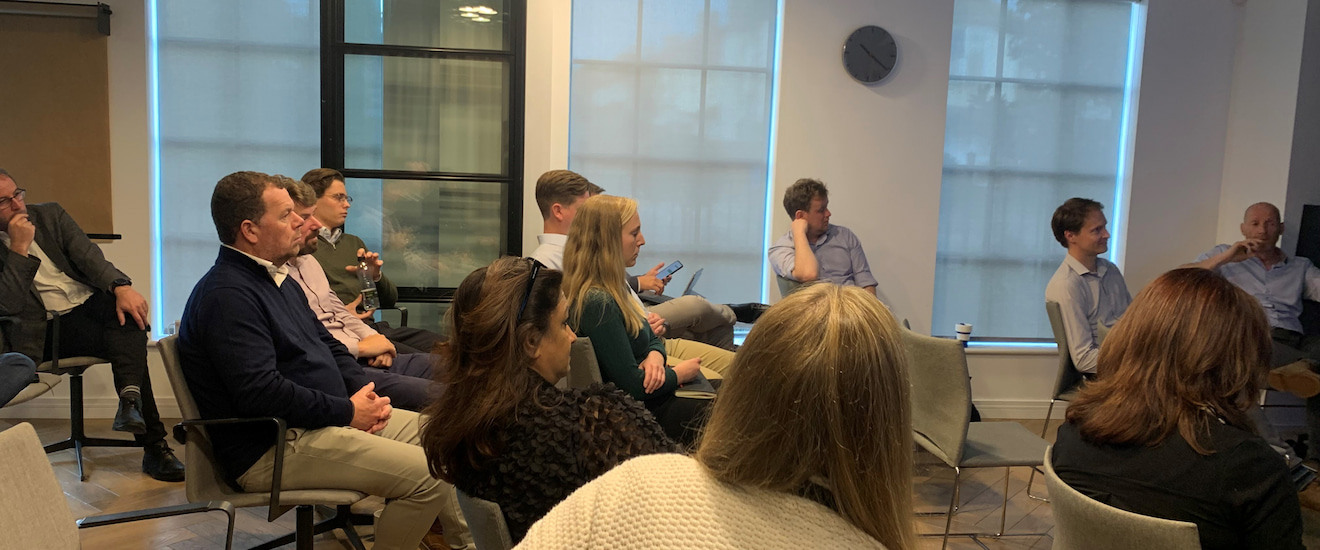 employees sitting at a company seminar