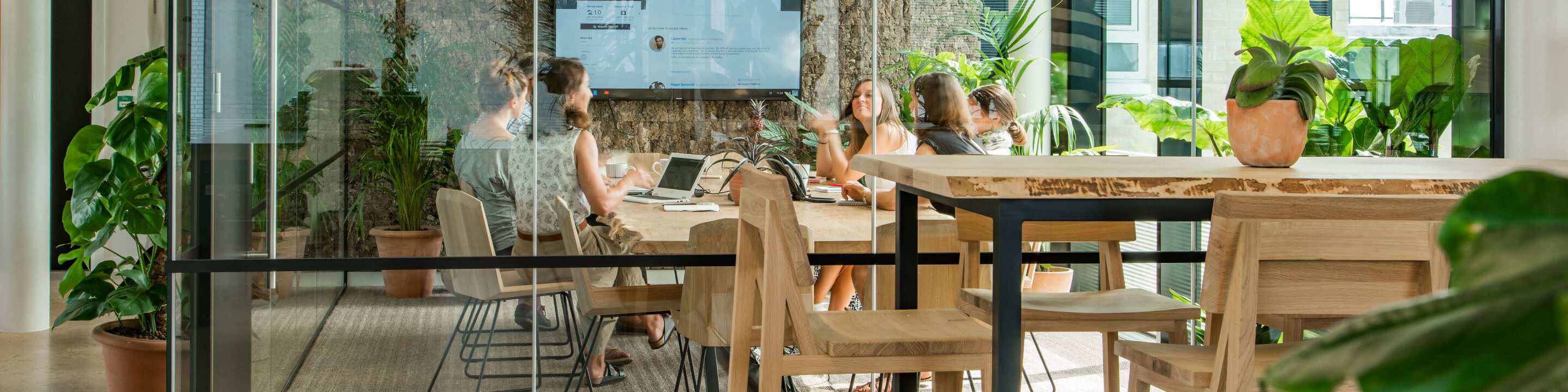 Employees gathered in a collaborative meeting space