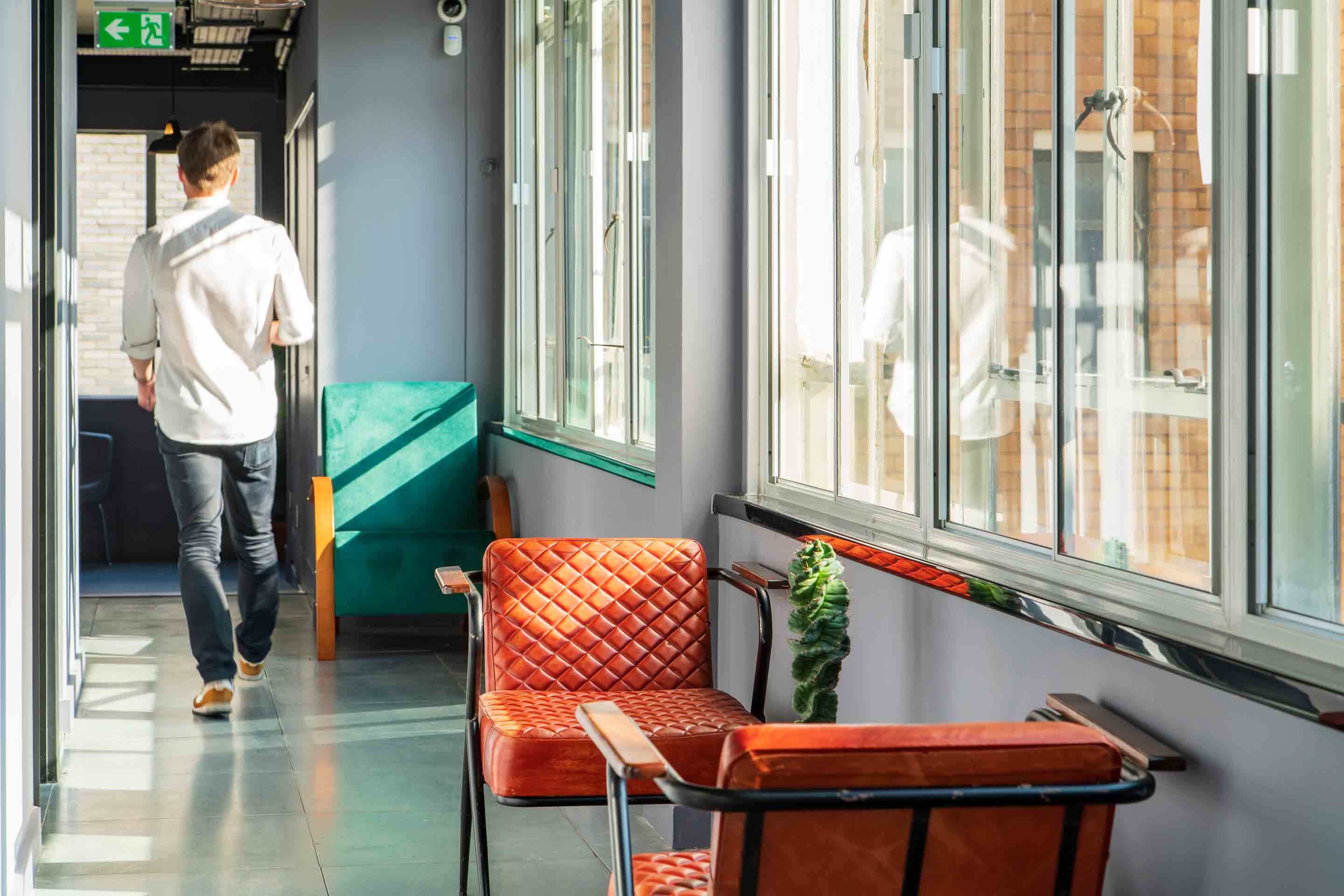 hallway with breakout seating areas