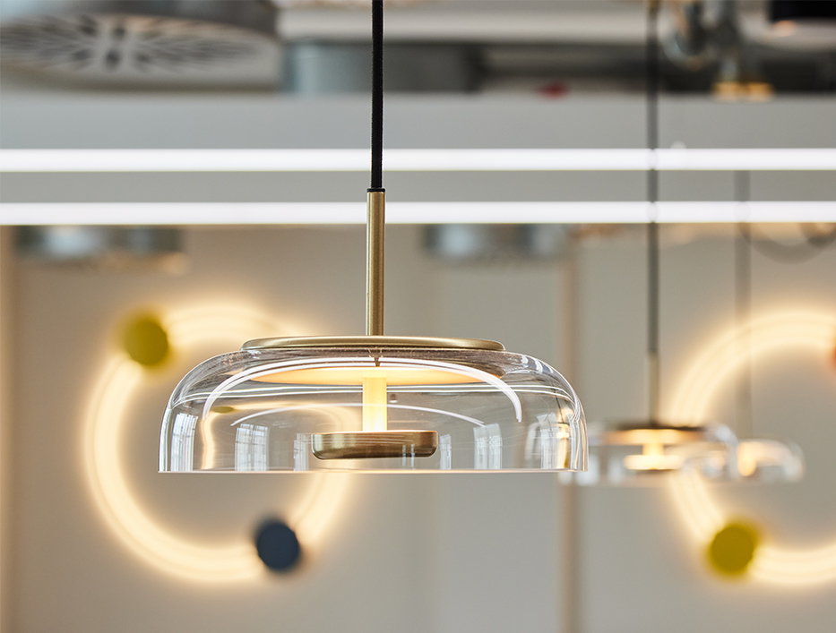Glass feature pendant lighting in an office kitchen