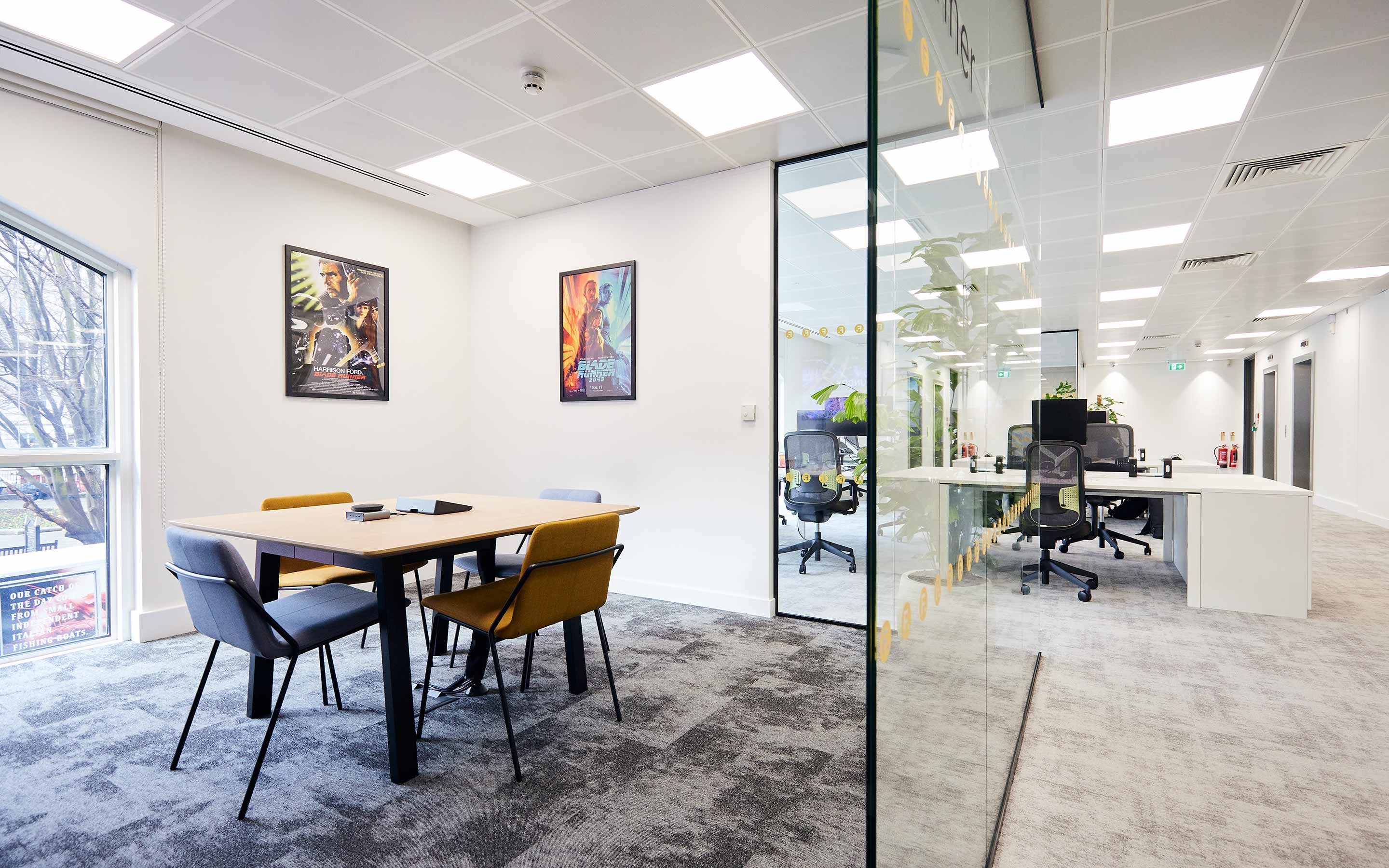 Office interior design showcasing a blend of functionality and aesthetics, promoting creativity and efficiency in the workplace