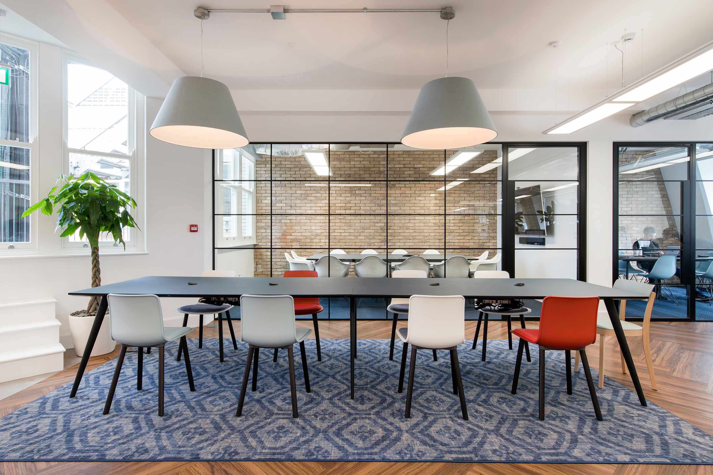 Suspended lighting over a large collaboration table