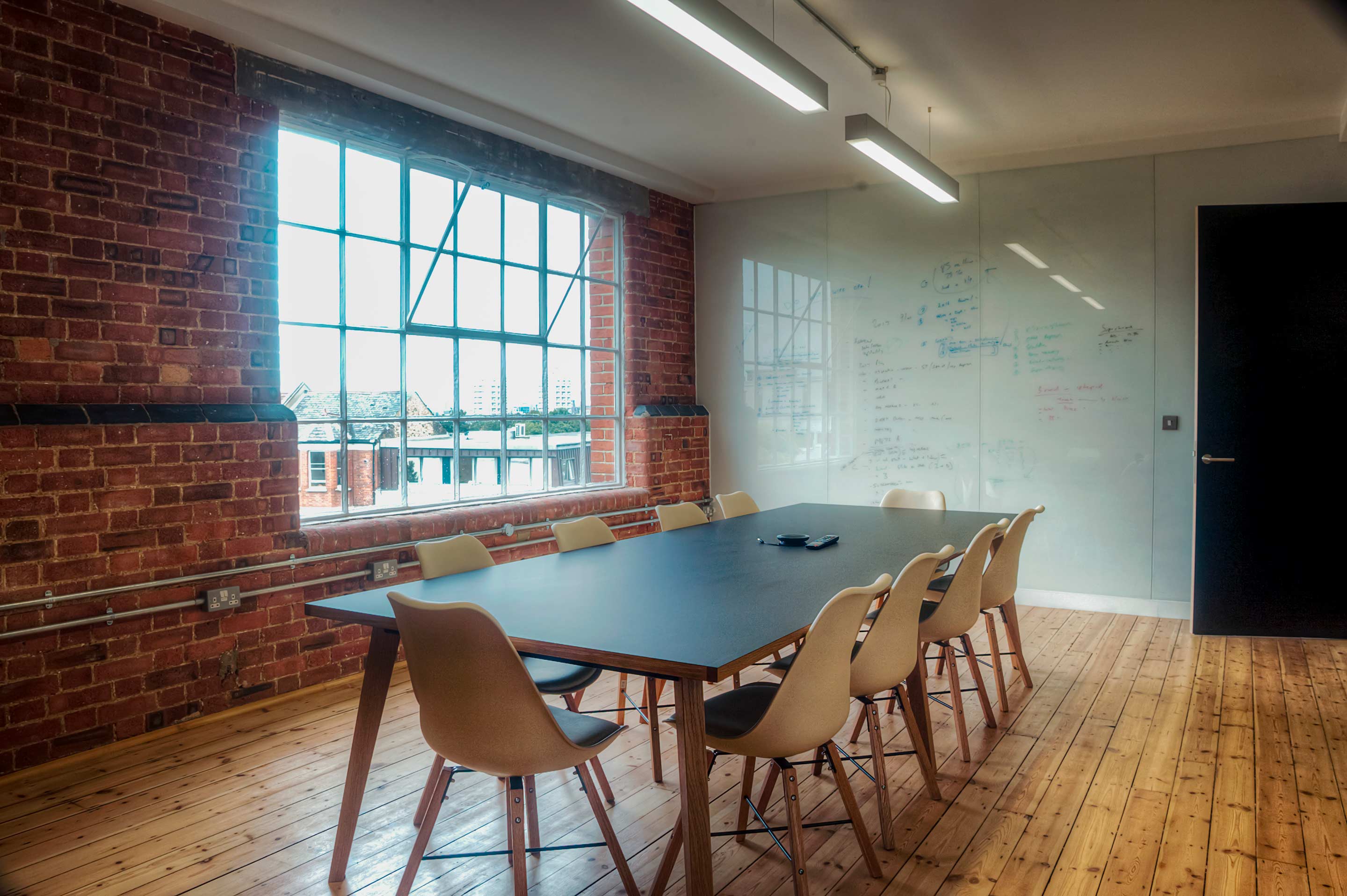 Naturally lit meeting room at Intrepid Travel's workspace