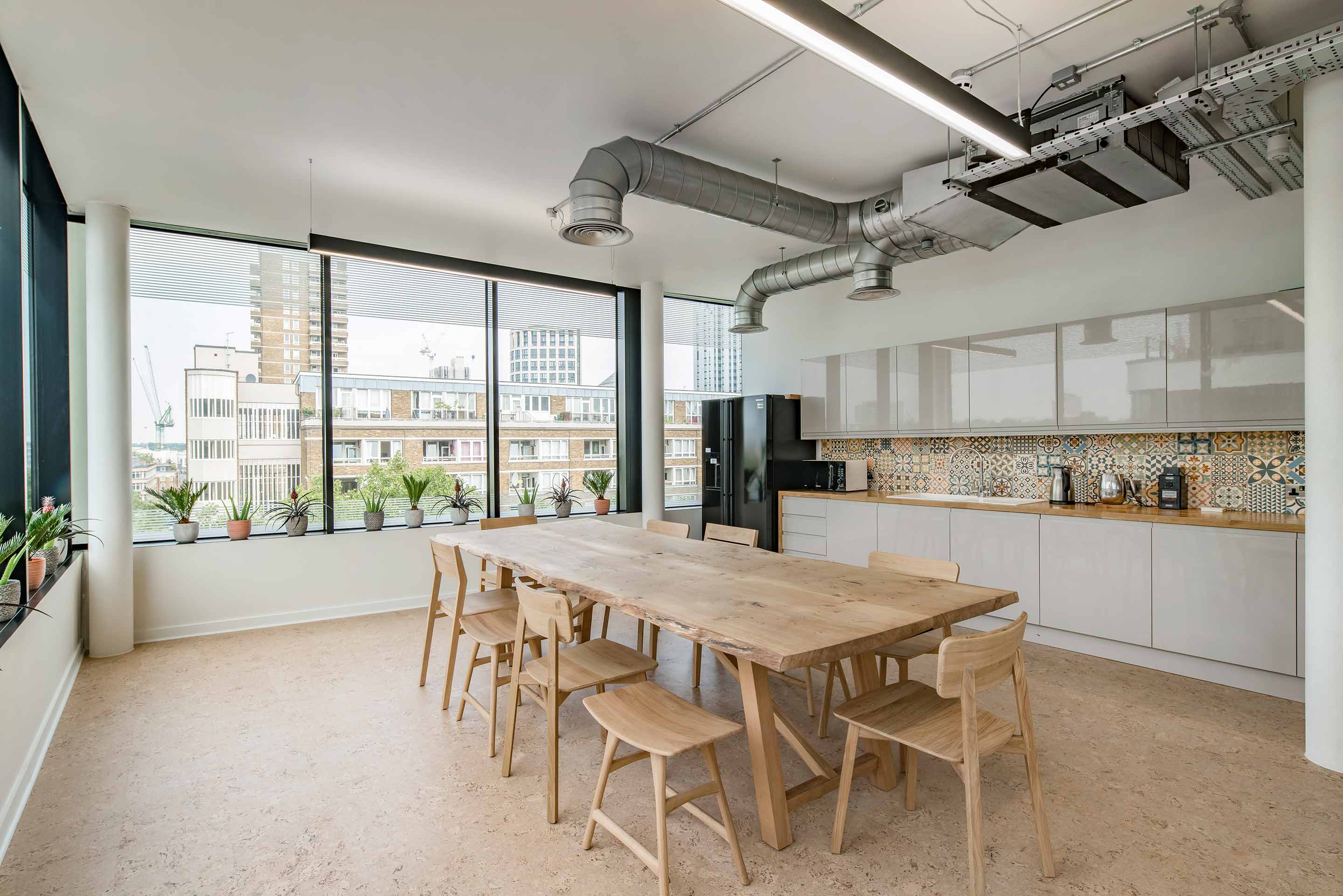 Tea point and kitchen area with seating