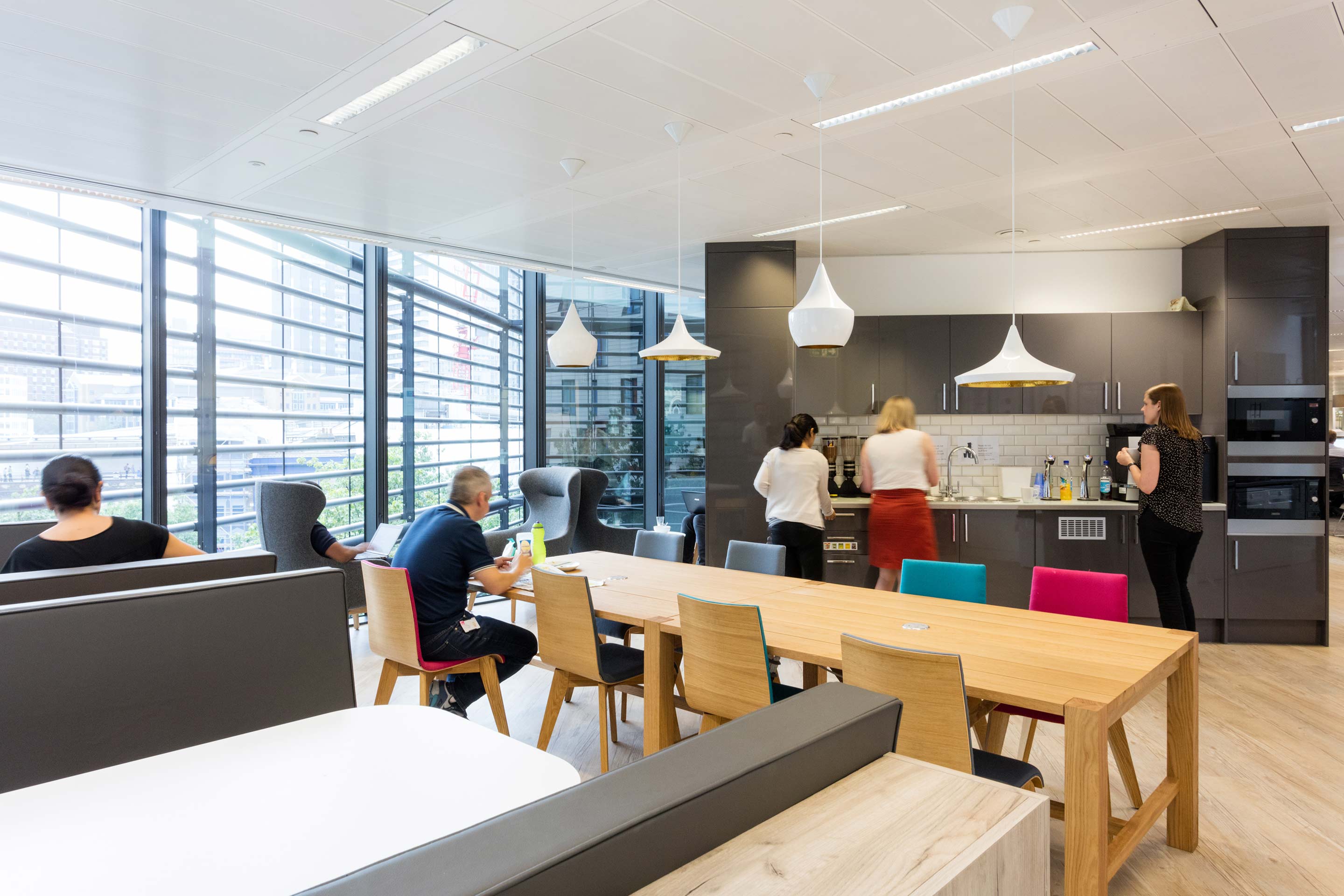 Bench seating and a tea point at Kantar TNS' workplace