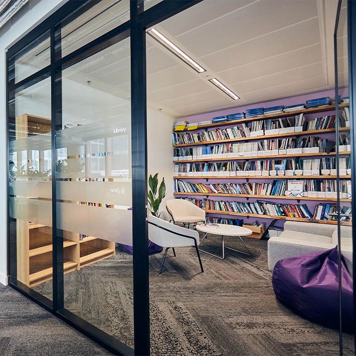office library for quiet time with soft seating and welcoming design