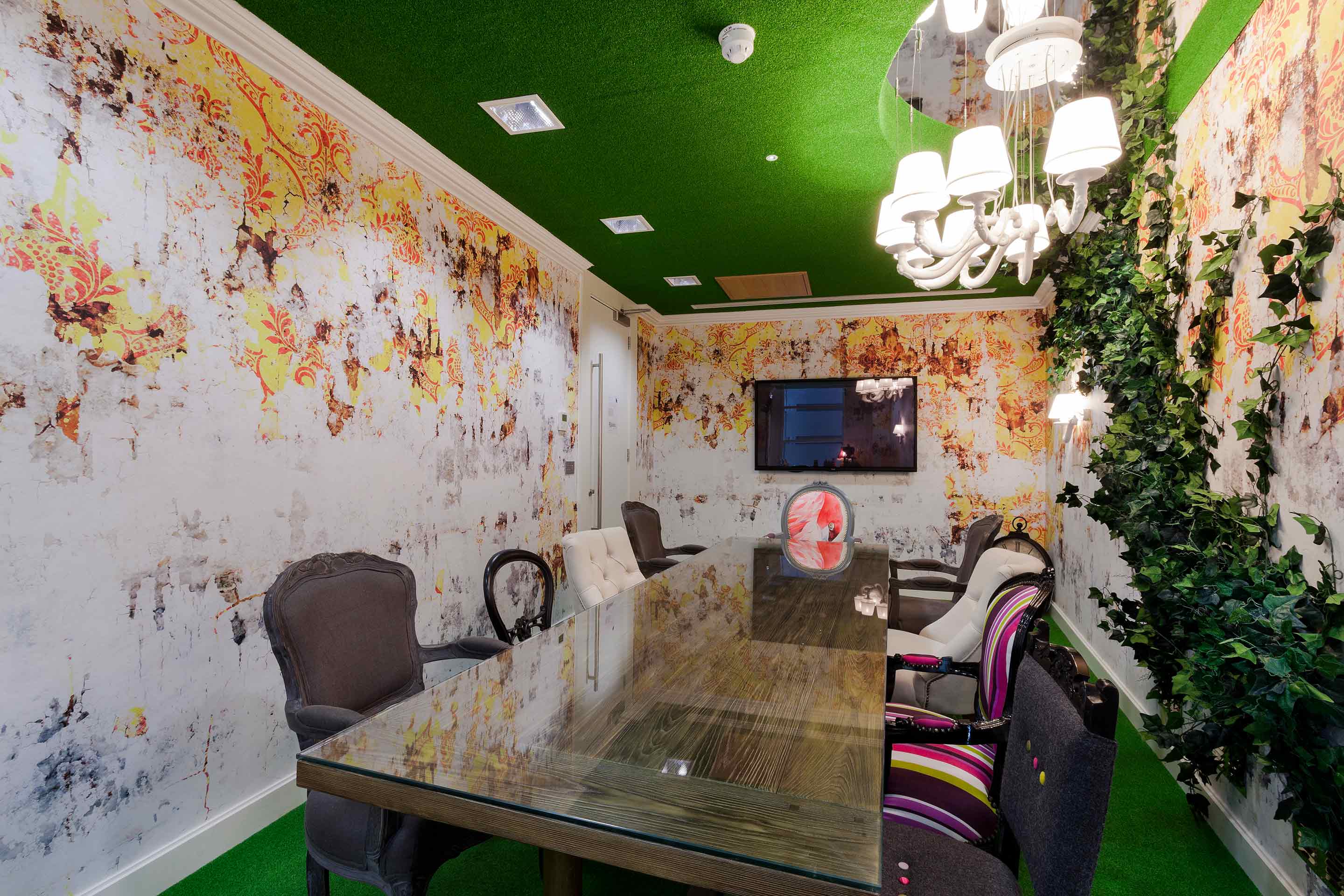A meeting room featuring bright colours and biophilia
