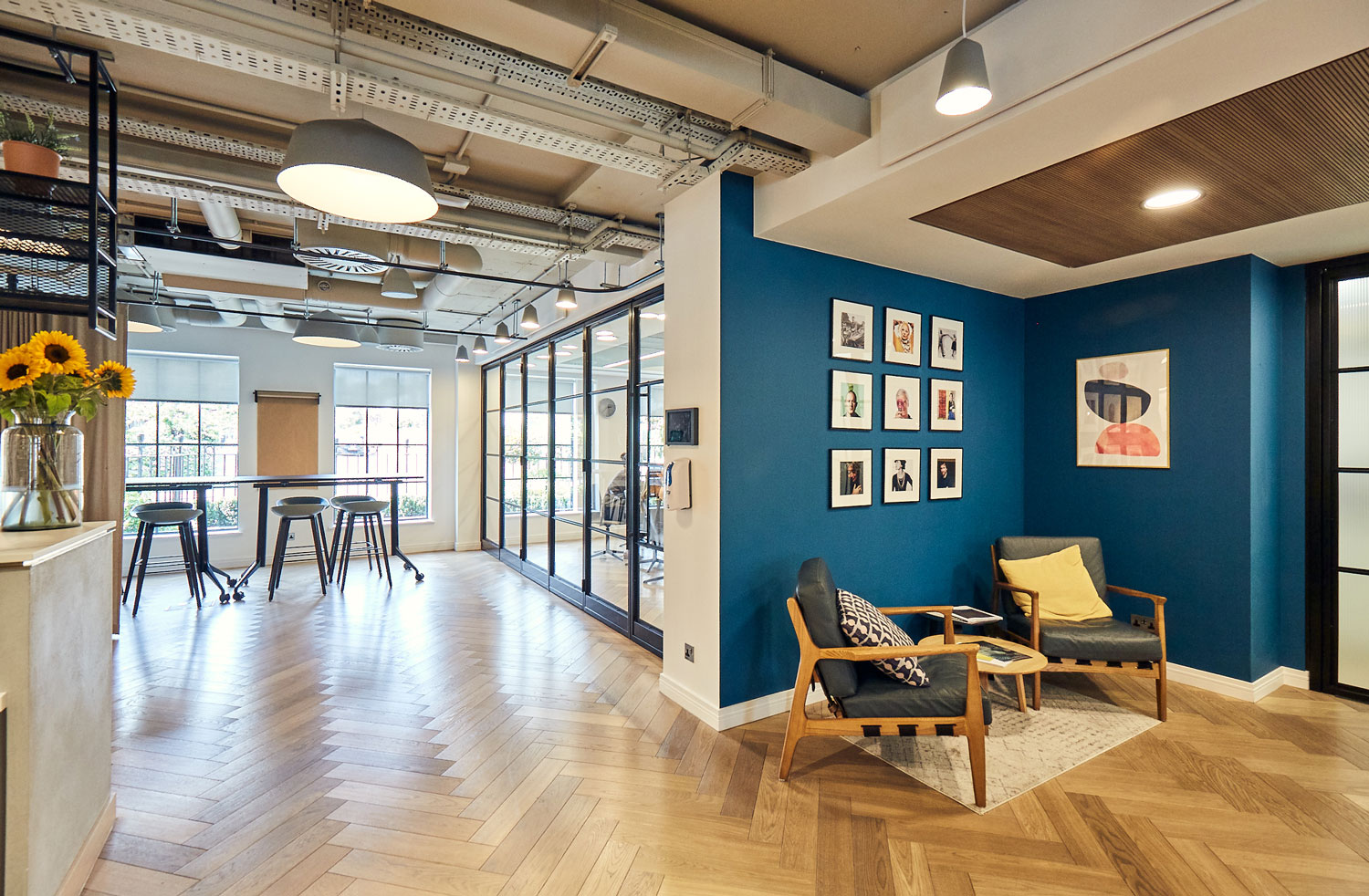 office interior with soft seating, breakout spaces and meeting room