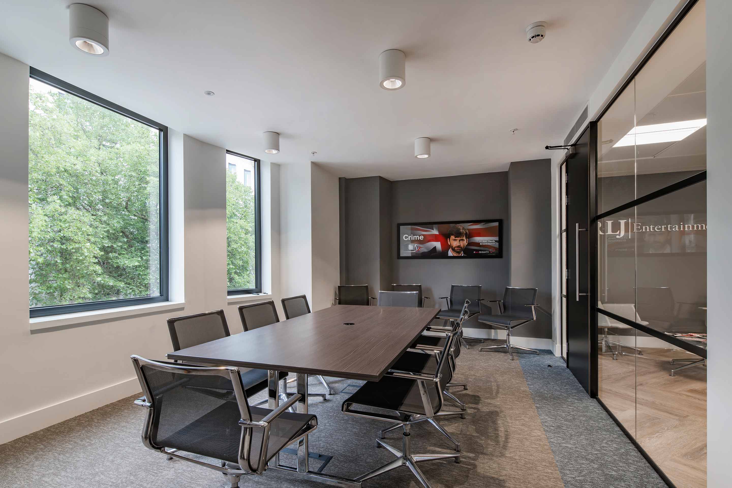 Dark wooden table in a meeting and boardroom