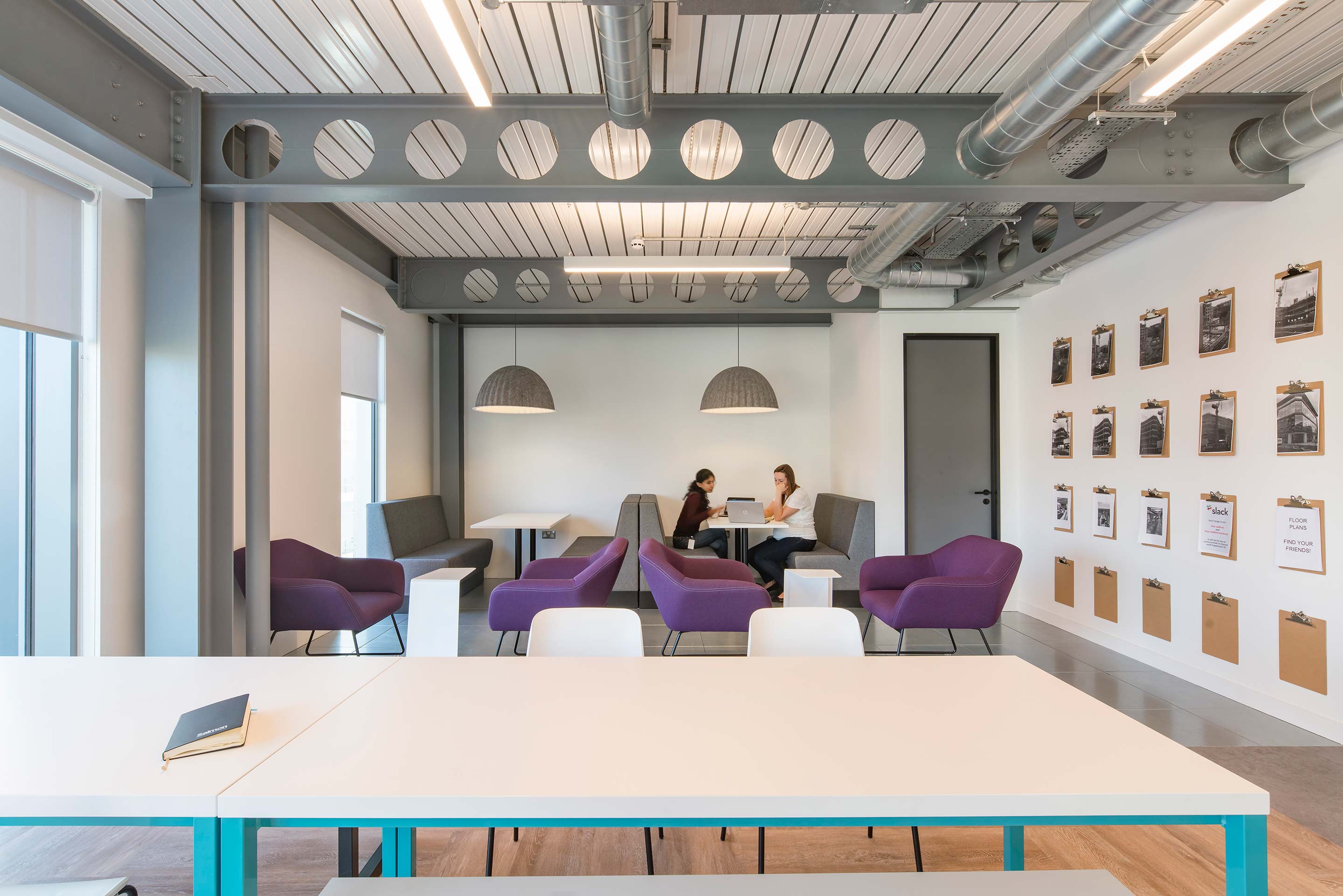 Desking and collaboration booths at Salmon's workplace in Watford