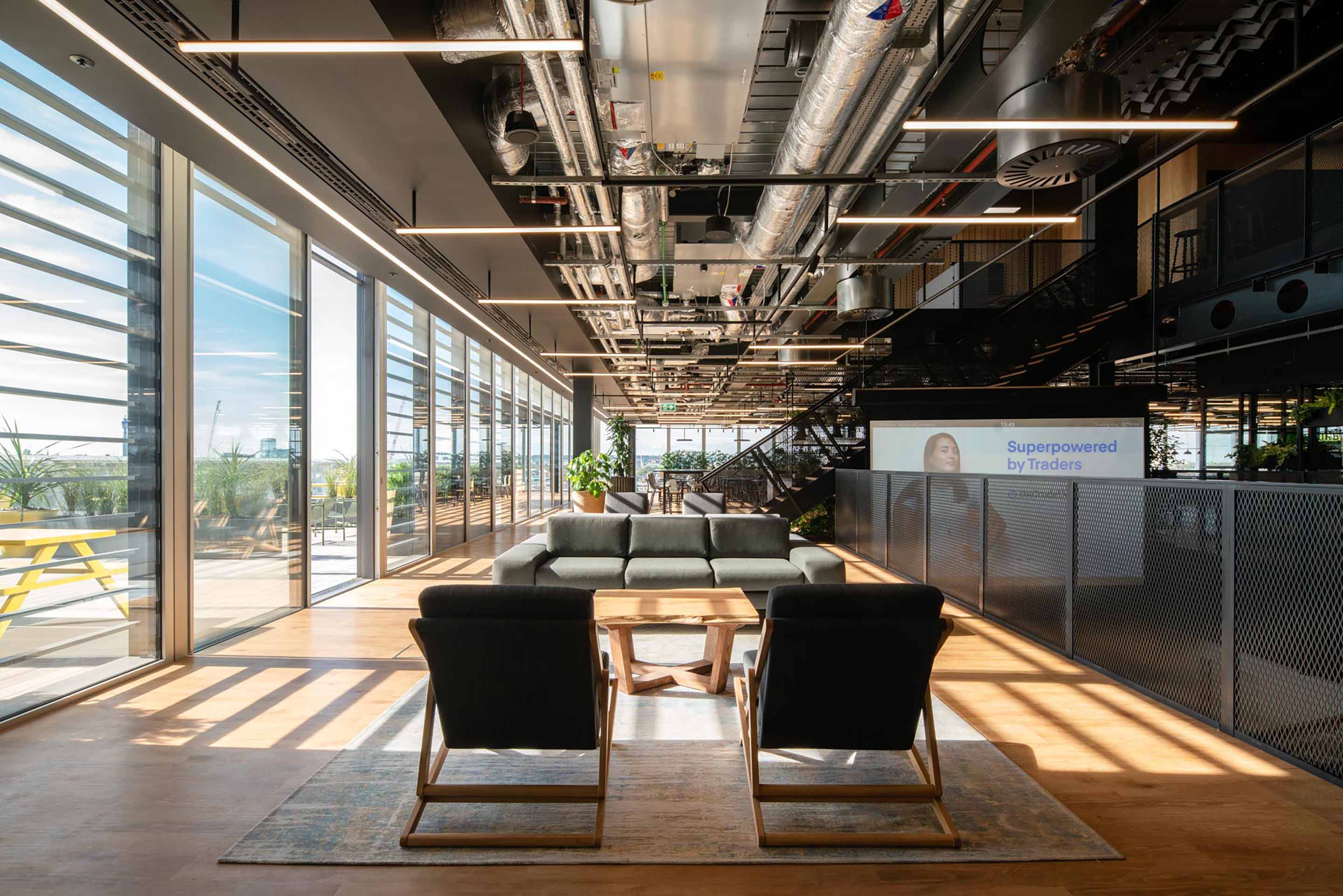 Naturally lit seating at The Trade Desk's workplace