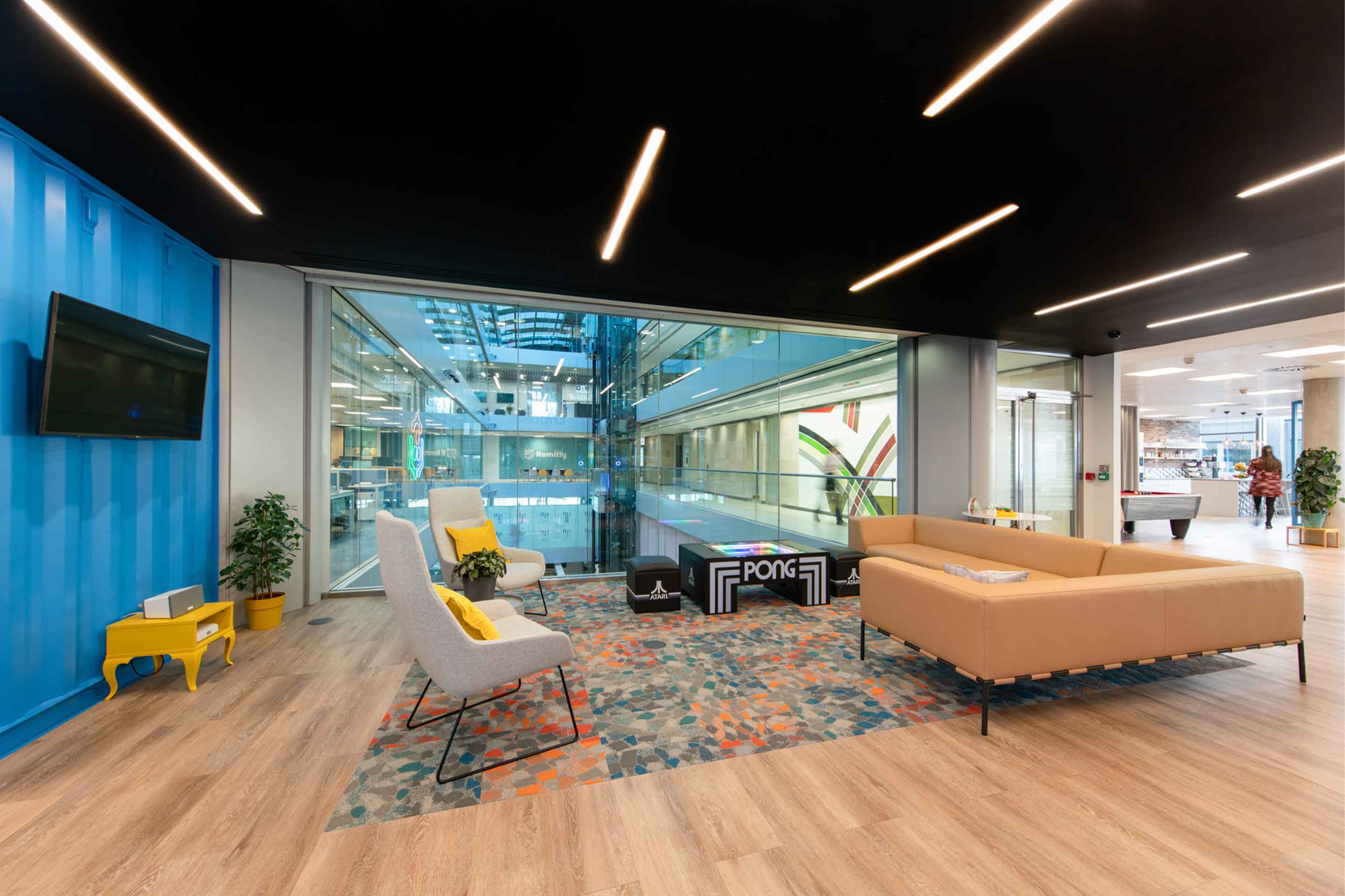 tripledot reception space with pong table and sofas