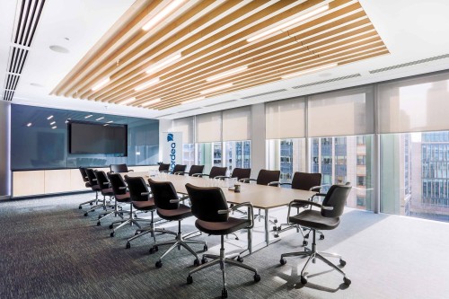 Wheeled seating around a large boardroom table