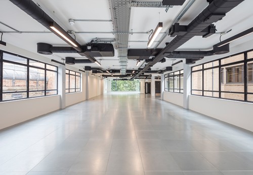An open plan office space we exposed ceiling features