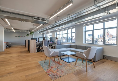 agile working space with desking and soft seating area and natural light
