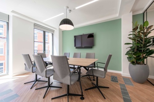 Small meeting room featuring biophilic design for Goodman
