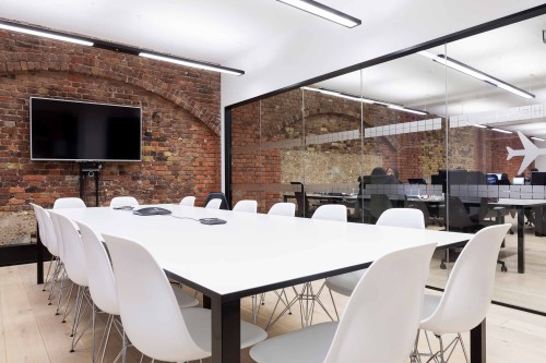 Glass walled boardroom and meeting space for Kayak